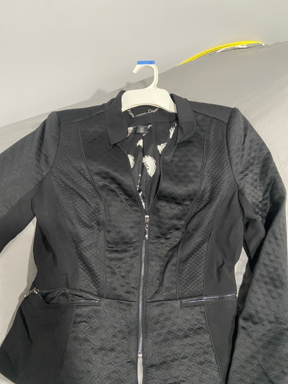 White House Black Market (WHBM) black quilted zipper blazer or jacket.